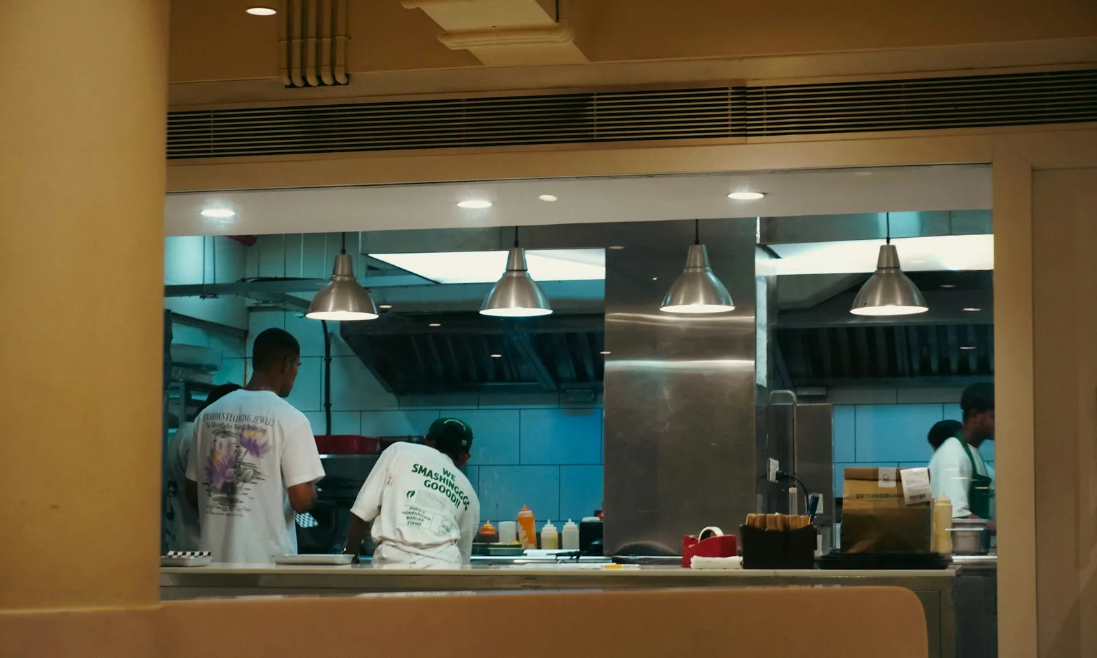 Restaurant kitchen team working during service