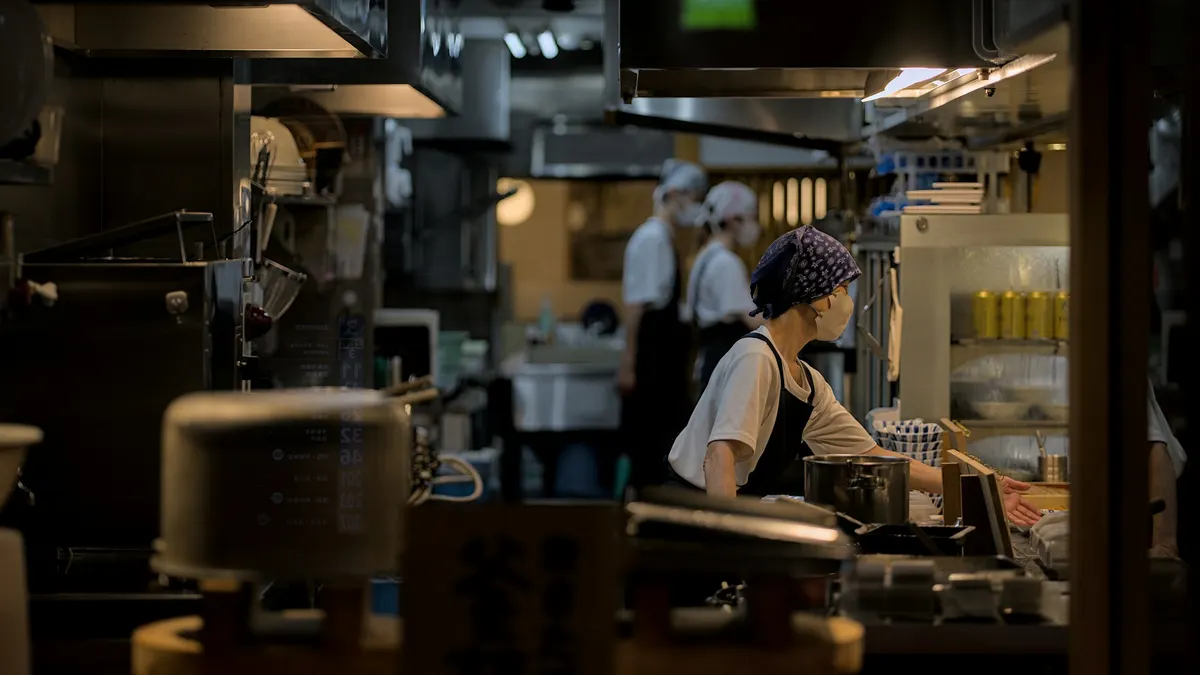 Ontario restaurant manager checking a short shift and payroll notes